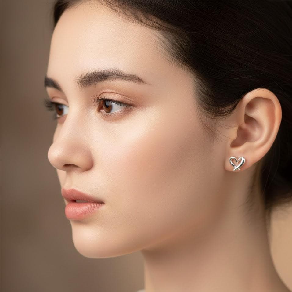 Sterling Silver Hollow Heart Stud Earrings