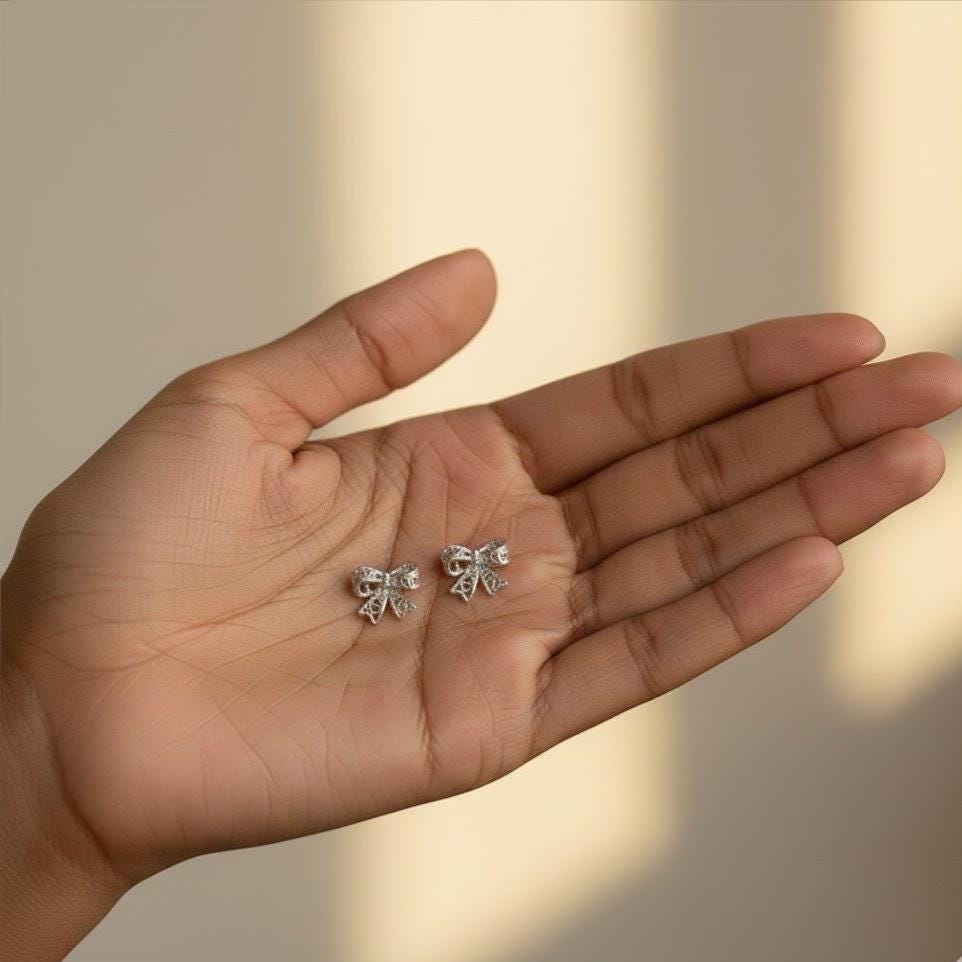 Sterling Silver Bow Tie Heart Stud Earrings