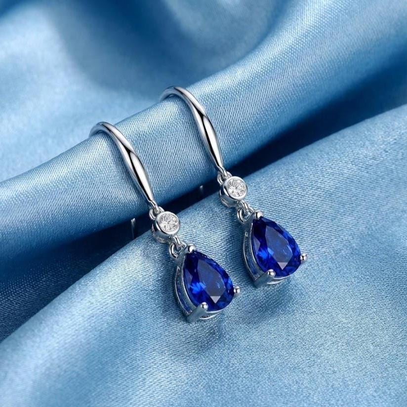 Sterling Silver Blue Pear Halo Drop Stud Earrings