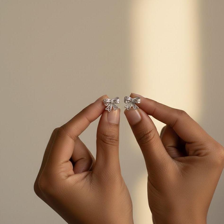 Sterling Silver Bow Tie Heart Stud Earrings