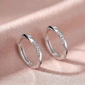 Elegant Crystal Huggie Hoop Earrings in Sterling Silver